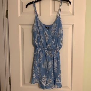 Aqua size small.Light blue romper with white palm leaf pattern.